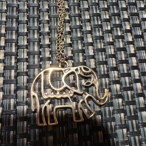 Gold elephant necklace.  Approximately 16”